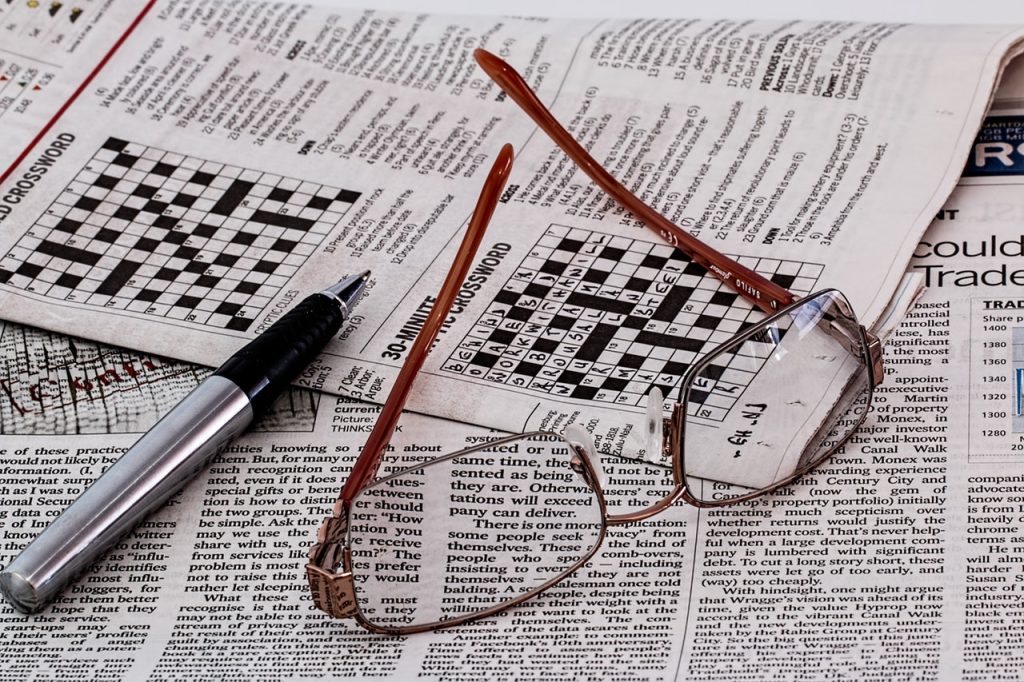 Crossword Puzzle and Newspaper-themed Placemats