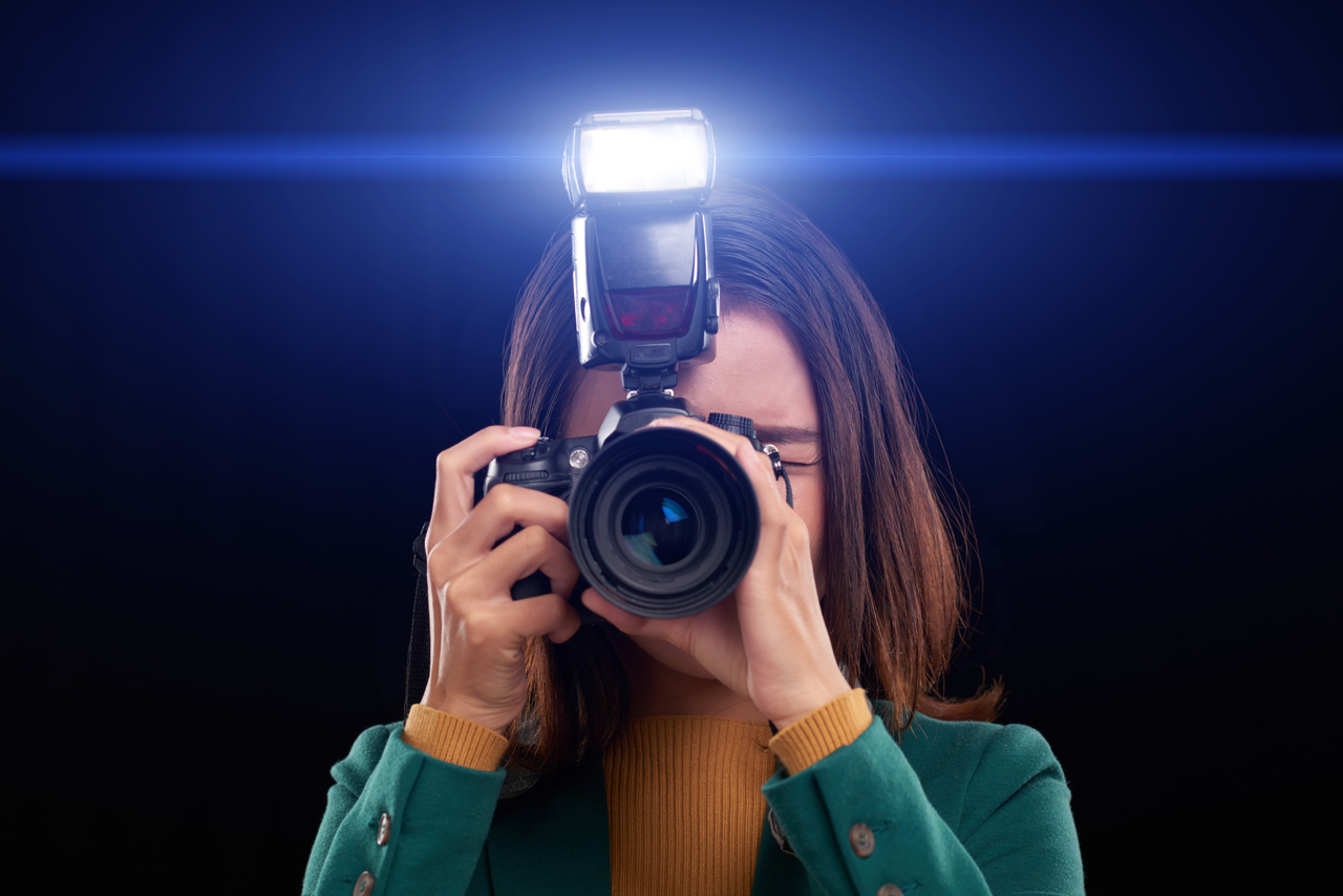 A female event photographer