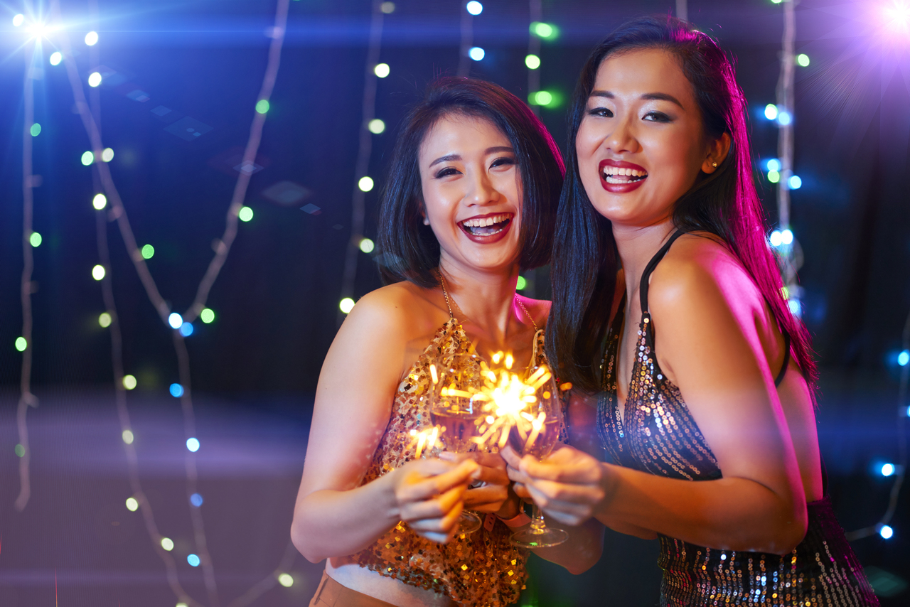 A debutante and her close friend enjoying her night