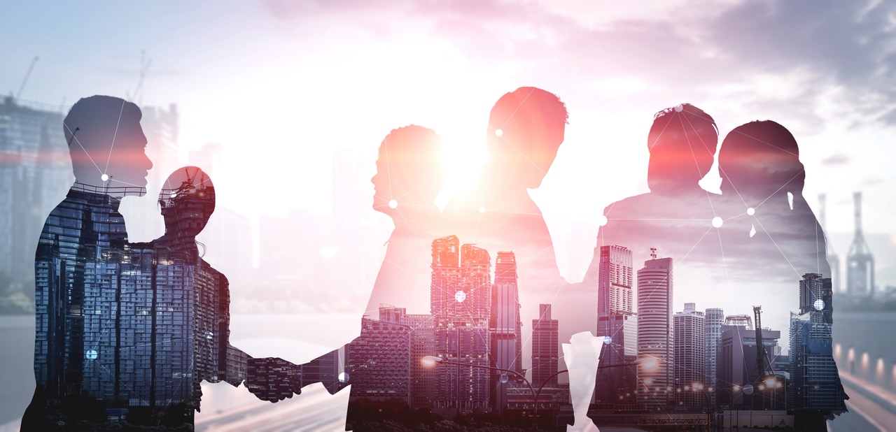 Double exposure image showing employees in an industrial park