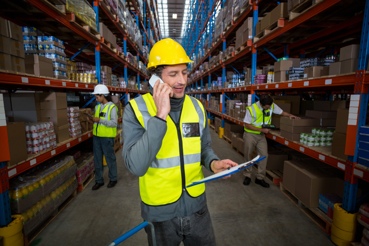 A man on the phone with his supplier